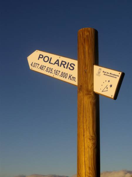 Signpost at an astronomical viewpoint on La Palma showing the distance to the pole star - 4,077,487,635,167,800 Km